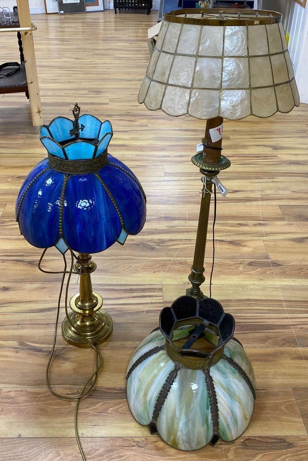 A brass column lamp and a brass standard lamp on three paw feet (with shades)